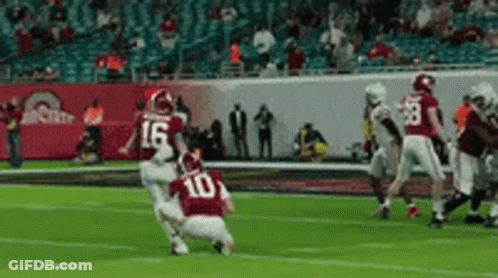 Football Player In Red Jersey Number 10 Kicking Ball GIF