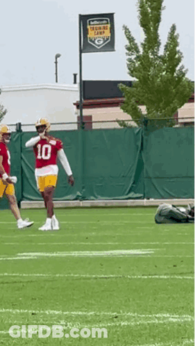 Football Player In Red Jersey Number 10 Running GIF