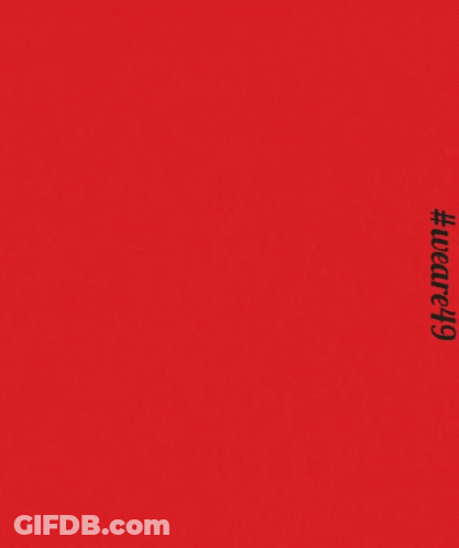 Football Player In Red Jersey Number 13 Jumping GIF