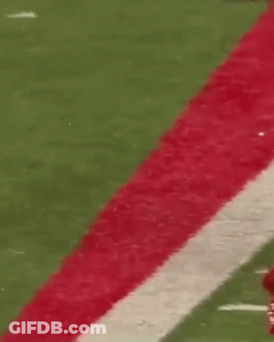 Football Player In Red Jersey Number 20 Running GIF