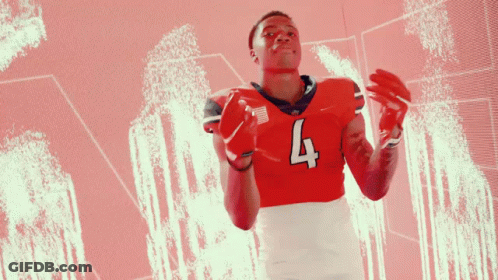 Football Player In Red Jersey With Number 4 GIF