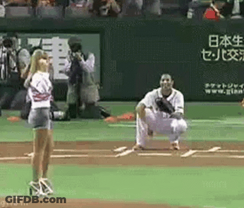 Football Player In Red Shirt Throwing Football GIF
