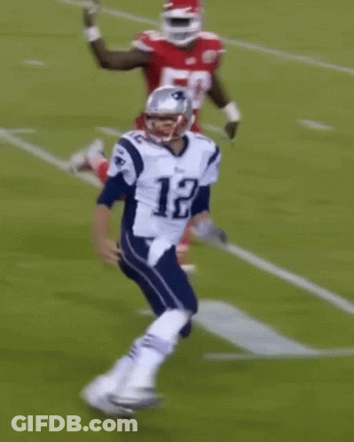 Football Player In Red Tackled By Player In White GIF