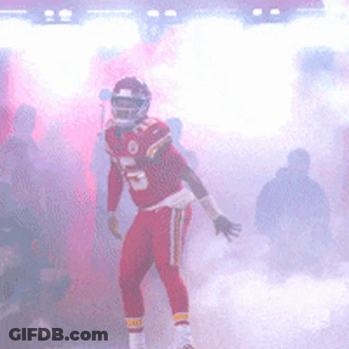 Football Player In Red Uniform Number 12 GIF