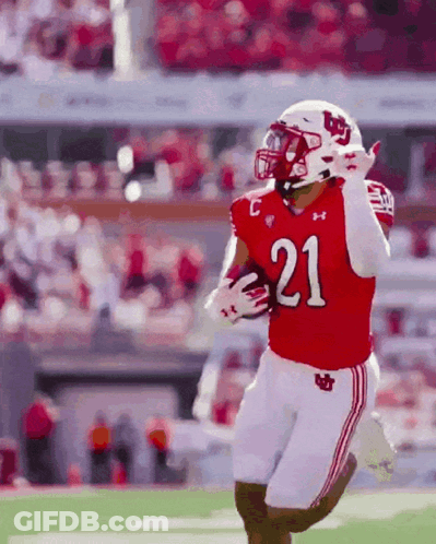 Football Player In Red Uniform Number 21 GIF