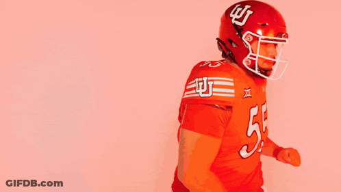 Football Player In Red Uniform Number 55 GIF