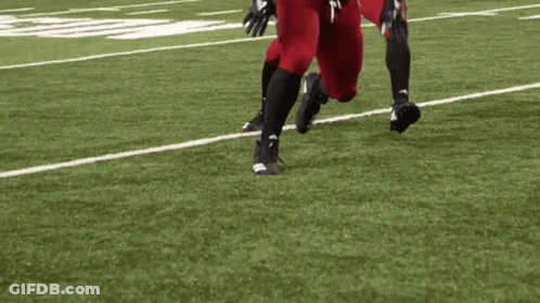 Football Player In Red Uniform Number 59 Running GIF