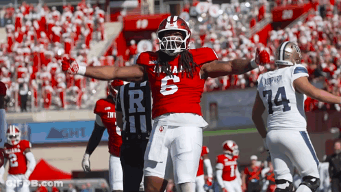Football Player In Red Uniform Number 6 GIF
