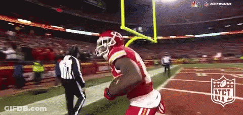 Football Player In Red Uniform Running To Goal Line GIF