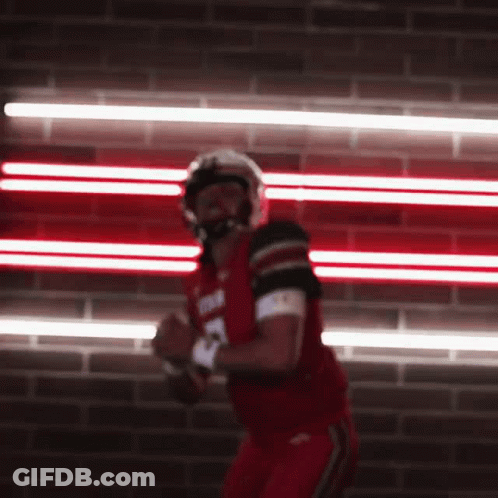 Football Player In Red Uniform Running With Ball GIF
