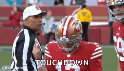 Football Player In Red Uniform Talking To Referee GIF