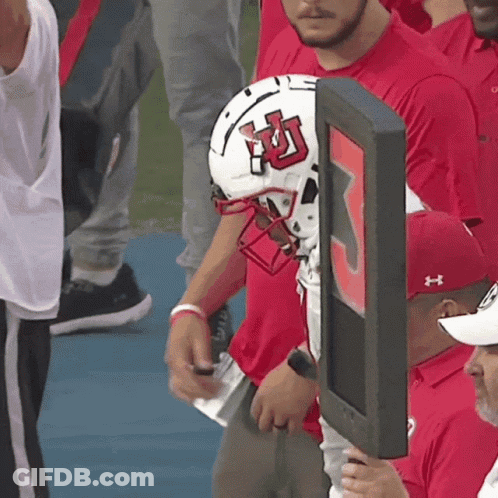 Football Player In Red Utah Jersey Holding Ball GIF