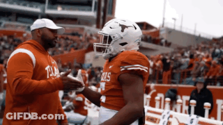 Football Player In Texas Jersey Shakes Hands GIF