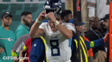 Football Player In Titans Jersey Helped Off Field By Doctor GIF