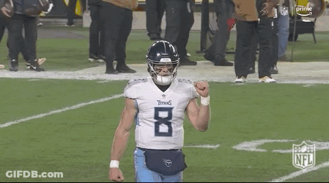 Football Player In Titans Jersey With Fist In Air GIF