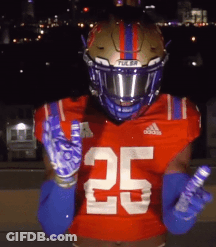 Football Player In Tulsa Helmet And Gloves GIF
