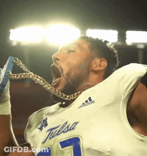 Football Player In Tulsa Jersey Holding Chain GIF