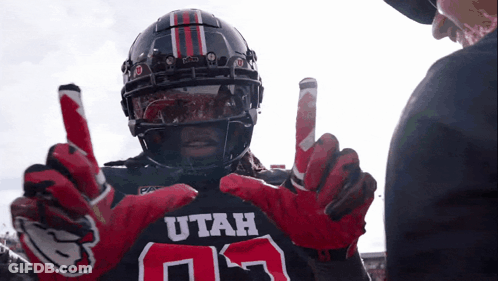 Football Player In Utah Jersey And Gloves Talks To Referee GIF