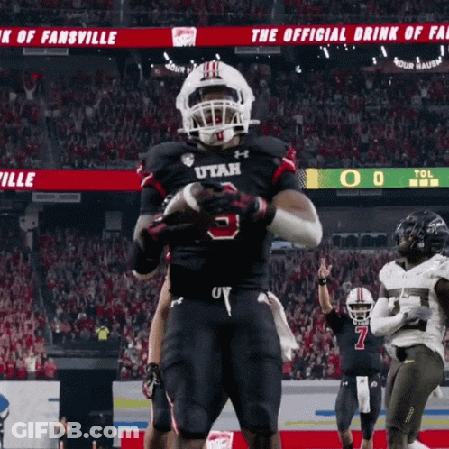 Football Player In Utah Jersey Holding Football GIF