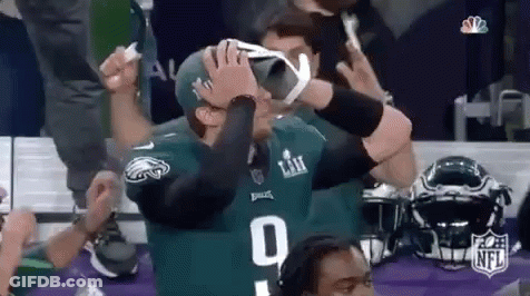 Football Player In VR Headset Celebrating Touchdown GIF