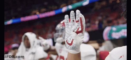 Football Player In White Gloves With Red C GIF