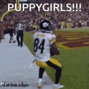 Football Player In White Jersey Number 84 Running GIF