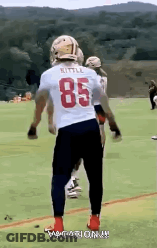 Football Player In White Jersey Number 85 On Field GIF