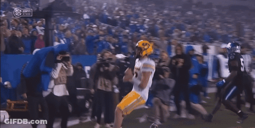 Football Player In Yellow Helmet Number 11 GIF