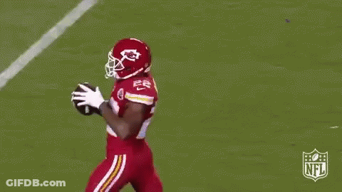 Football Player Jumping To Catch Ball GIF