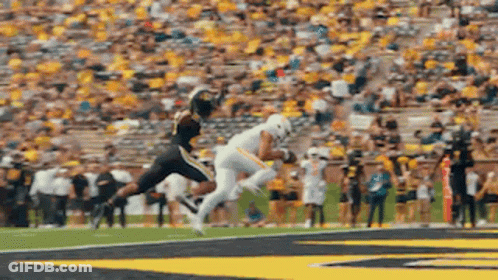Football Player Jumping To Catch Ball GIF