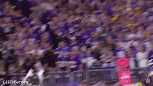 Football Player Jumping To Catch Ball GIF
