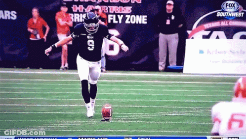 Football Player Kicking Ball In Fly Zone GIF