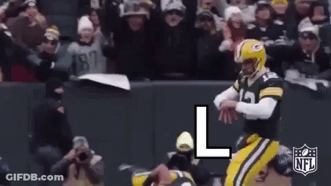 Football Player Kicking Ball In Helmet GIF