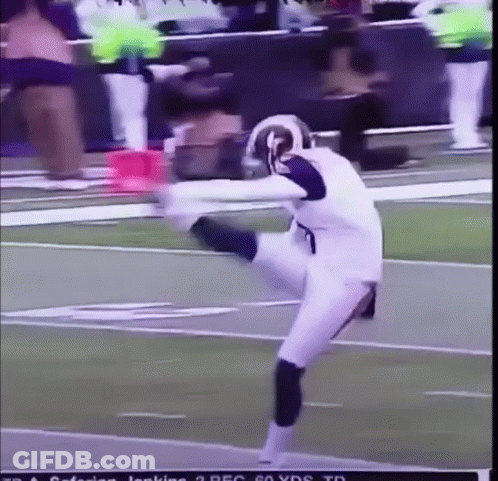 Football Player Kicking Ball Wearing Rams Helmet GIF