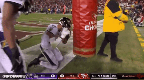 Football Player Kneeling Before Red Bag Saying Inspiration GIF