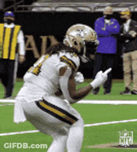 Football Player Kneeling Giving Middle Finger GIF