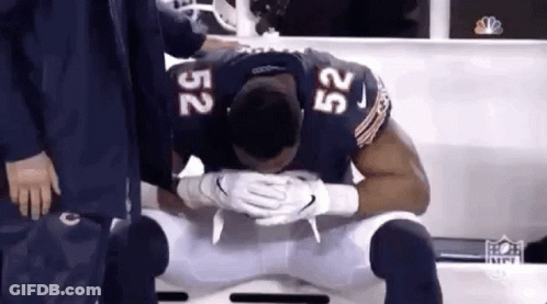 Football Player Kneeling Head Down GIF
