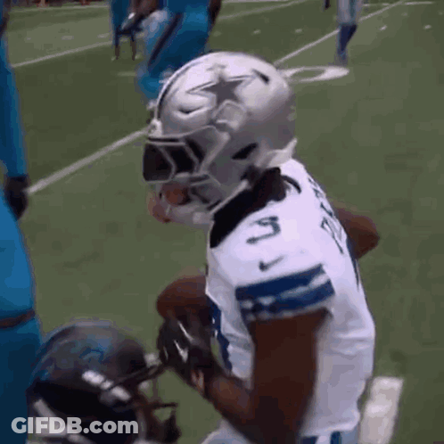 Football Player Kneeling On Field GIF