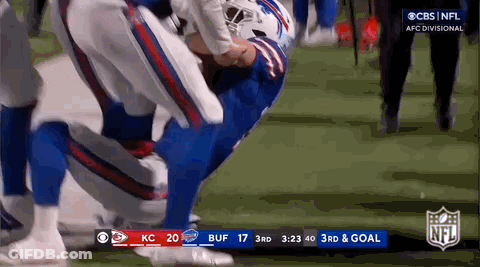 Football Player Kneeling On Field During Game GIF