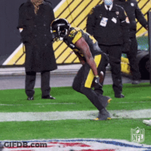 Football Player Kneeling With NFL Logo GIF