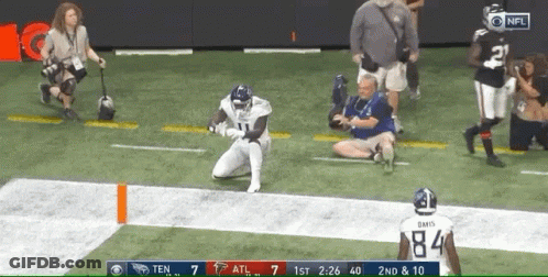 Football Player Kneeling With Number 84 GIF