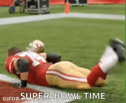 Football Player Laying On Field Super Bowl Time GIF