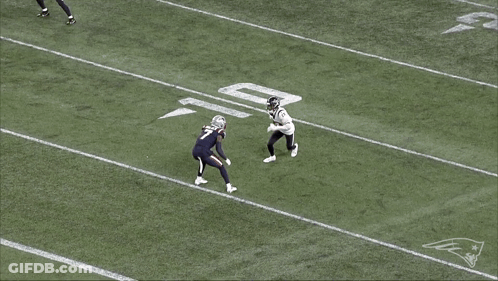Football Player Laying On Field With Patriots Logo GIF