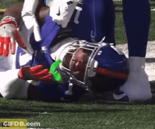 Football Player Laying With Yellow Side Sign GIF