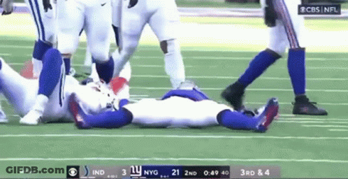 Football Player Lying On Field Vs Indianapolis Colts GIF