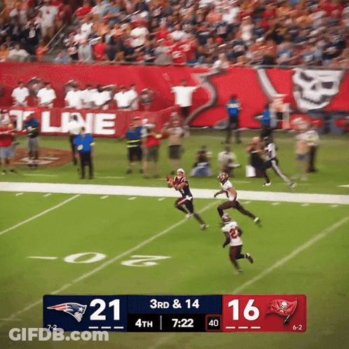 Football Player Lying On Ground Head In Hands GIF