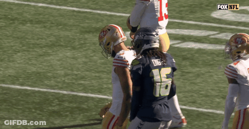 Football Player Mike Evans Standing On Field GIF
