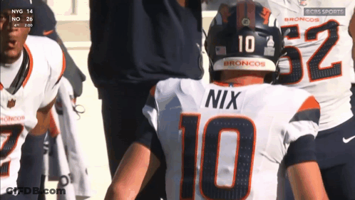 Football Player Nix On Back GIF