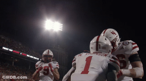 Football Player Number 1 Hugging Another Player GIF