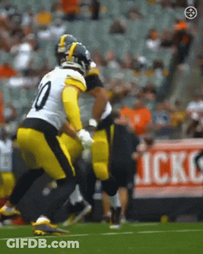 Football Player Number 10 Being Tackled GIF